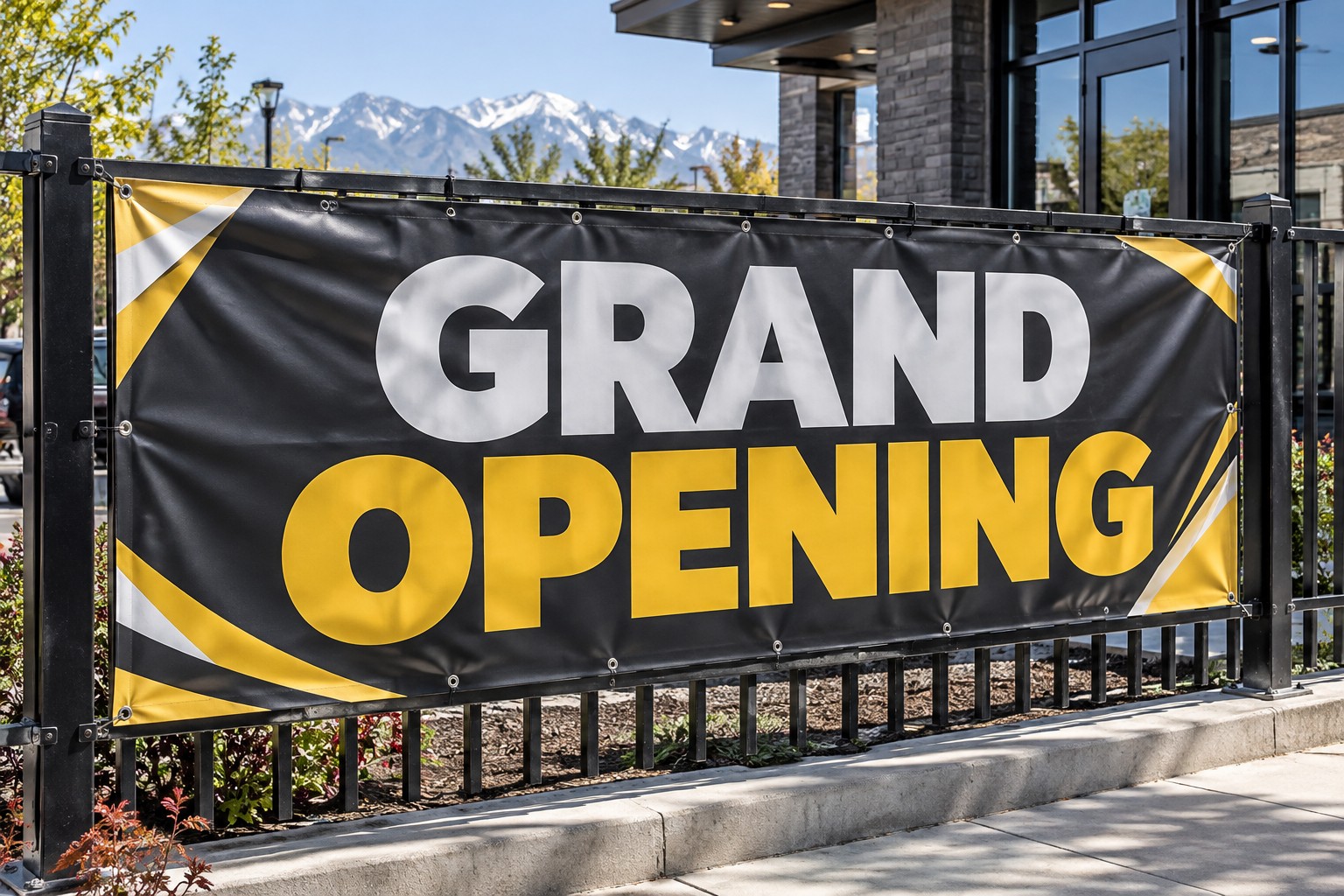Outdoor grand opening vinyl banner mounted with grommets